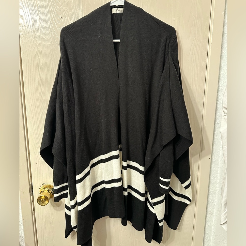 Women's poncho with arm insert